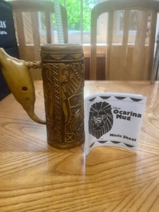 DISNEY PARKS OCARINA BECHER KOMPLETT MIT STROHHALM UND MUSIKBLATT NEU IN OFFENER TASCHE - Bild 1 von 9