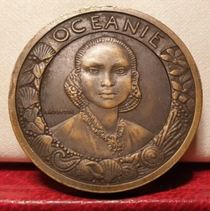 1931 32mm medalla ART DECO EXPOSICIÓN COLONIAL OCEANÍA POR MOUROUX - Imagen 1 de 2
