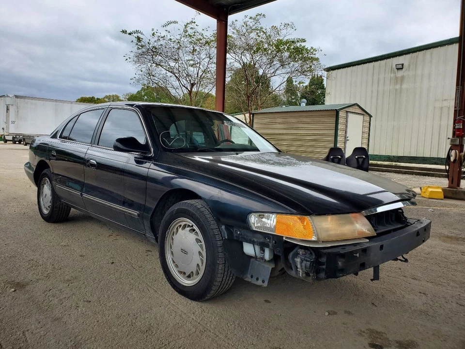Lincoln Continental 1995 2002 OEM regulador de ventana delantera izquierda con motor  Foto 1 de 4