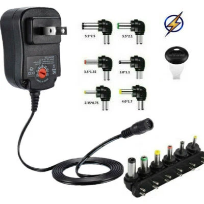 AC/DC Adapter Switching Power Supply w/ 6 Selectable Plugs 3/4.5/5/6/7.5/9/12V . - Image 1 of 4