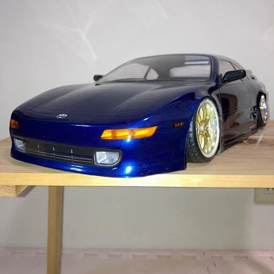 ABC Hobby MR2 SW20 RC carrocería de coche solo 1/10 con silenciador ficticio espejo luces de ala Foto 1 de 4