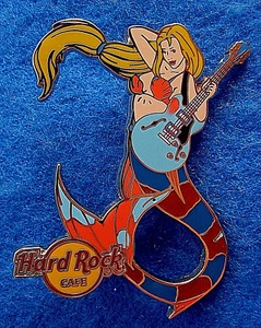 PIN ONLINE SEXY RUBIA NIÑA SIRENA SERIE 06 CONCHAS NARANJAS Hard Rock Café LE100 - Imagen 1 de 1
