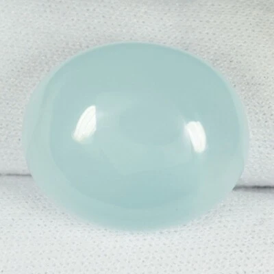 27.95 ct MILKY GLOW 100%  NATURAL AQUAMARINE  Oval Cabochon GEMS See Vdo DB - Image 1 of 3