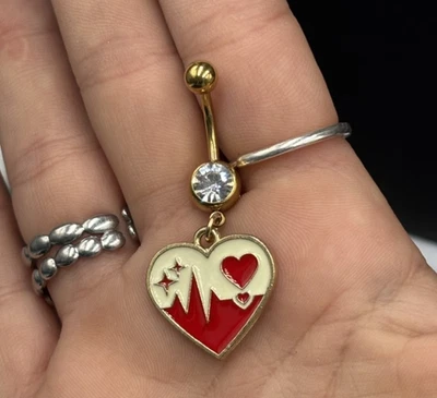 Piercing Banana 1,6x10 con zircone in Acciaio Chirurgico dorato pendente cuore - Immagine 1 di 2