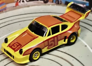 Faller Aurora 5655 -- Porsche 934 Turbo con motor G-Plus, años 70 #EBS1521 - Imagen 1 de 3