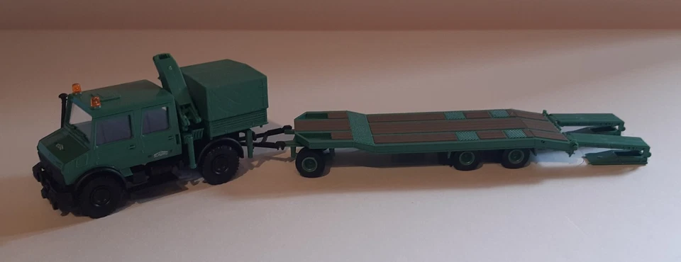 Roco Min. Mod. 1493 UNIMOG U 1700 Tieflader "SCHWARZBAU" OVP + NEU - Bild 1 von 1