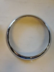 CROWN AUTOMOTIVE J0649518 HEADLIGHT BEZEL - Picture 1 of 2