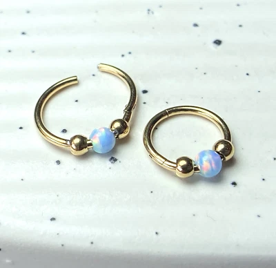 Joyería corporal clicker de tabique hélice anillo segmento bola ópalo 1 pieza Foto 1 de 4