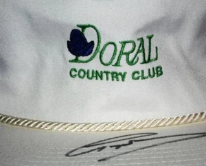 GORRA DE GOLF GREG NORMAN FIRMADA DORAL COUNTRY CLUB CUERO BLANCO SNAPBACK - Imagen 1 de 6