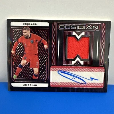 2023 Panini Obisidian  Collection Champions Luke Shaw Auto Relic 16/44 - Image 1 of 2