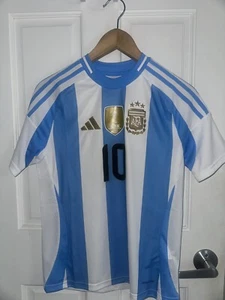 KIDS 13-14 Size L Argentina 24/25 Home Jersey Lionel Messi (RegPrice: $110) - Picture 1 of 3