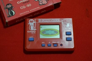 SELTEN 1985 CASIO CG-90 LUSTIGER ZIRKUS ELEKTRONISCHER HANDHELD LCD SPIEL ARGENTINIEN - Bild 1 von 4