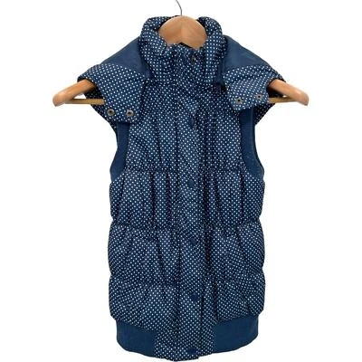 Chaleco acolchado con capucha frontal con botones a lunares azul marino dELiA*s talla pequeña Foto 1 de 4