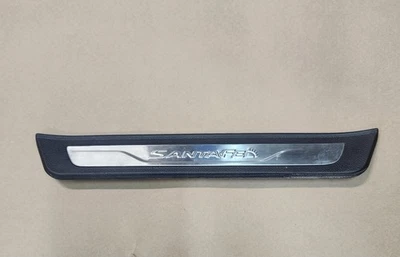 2013-2019 HYUNDAI SANTA FE REAR LEFT DOOR SILL SCUFF PLATE  OEM 85879-B8500 - Image 1 of 4