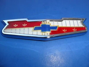 1958 CHEVROLET IMPALA BEL AIR HOOD EMBLEM WITH BEZEL-V/8-TRIM PARTS-NEW-USA     - Picture 1 of 3