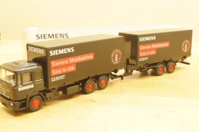 Ho 1:87 WIKING Somo Werbemodell Man F 90 Wechselkoffer-Zug " Siemens Mobil " - Immagine 1 di 4