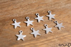 8 x  Silver Metal Charms Star Charms Small Jewellery Making Craft Double Sided - Picture 1 of 7