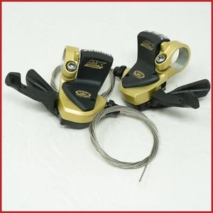 NUEVO DE LOTE ANTIGUO SHIMANO DEORE LX SL-M570 PALANCAS DE CAMBIO DORADAS DE COLECCIÓN MTB 9 VELOCIDADES - Imagen 1 de 6