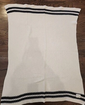 Manta bebé Domani Home algodón tejido marfil con rayas negras Foto 1 de 2