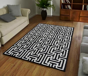 Alfombra acolchada a mano de lana geométrica blanca y negra - Imagen 1 de 7