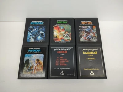 Vintage Atari 2600 Game Lot Asteroids Berzerk Defender Combat Indy 500 Basketbal - Image 1 of 4