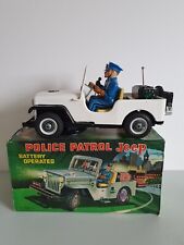 TN Nomura Japan Mystery Action Car Police Patrol Jeep Blechspielzeug 50er OVP