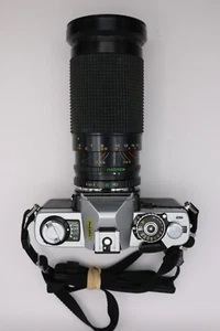 Minolta XG-1 analoge Spiegelreflexkamera 35 mm mit Zoomobjektiv - Bild 1 von 15