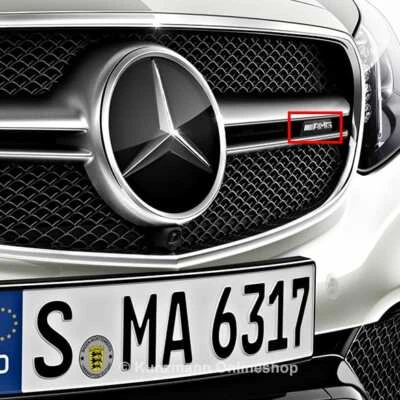 E 63 AMG Logo Schriftzug Kühlergrill E-Klasse W212 Original Mercedes-Benz NEU - Bild 1 von 2
