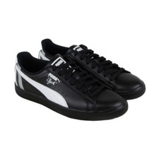 white puma shoes with black stripe