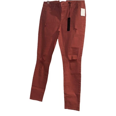 Pantalones de mezclilla rasgados con leggings ajustados de piel Charlotte Russe rechazados rosa talla 8 Foto 1 de 4