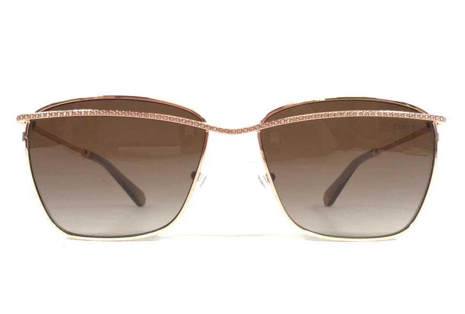 Óculos de sol Swarovski SK7006 403013 ouro rosa com cristais rosa e lentes marrons - Imagem 1 de 4