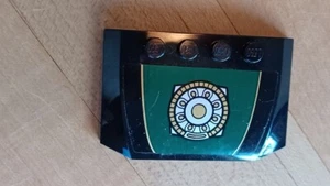 Lego Black Wedge 4x6x2/3 w/ Gold and Silver Ring on Dark Green Pattern set#76006 - Picture 1 of 1