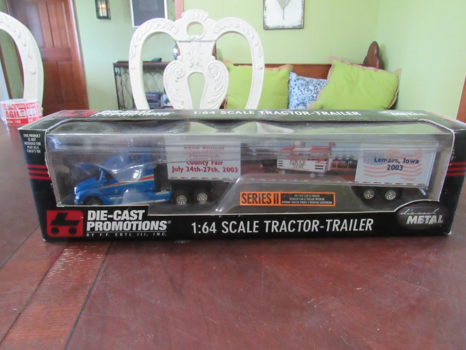 DCP 1/64 #30297 LTD. ED. 2003 PLYMOUTH COUNTY IA FAIR FREIGHTLINER W/VAN TRAILER - Image 1 of 4