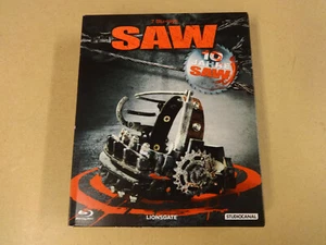 7-DISC BLU-RAY BOX / SAW - 10 JAHRE SAW (MOVIES 1-7) - Imagen 1 de 2