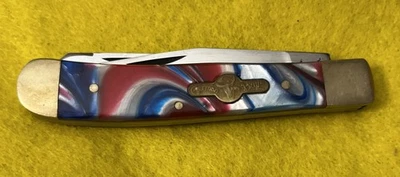 NAVAJA DE BOLSILLO ALEMANA BULL ROJA/BLANCA/AZUL REMOLINO MANGO CORELÓN Foto 1 de 4