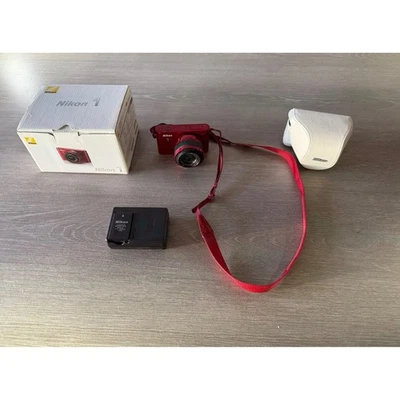 Nikon 1 J1 Digital Camera 10-30mm Lens Kit Red with Accessories - Image 1 of 4