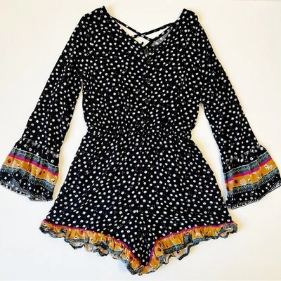 Mameluco negro estampado floral marca Target niños talla mediana 7/8 Foto 1 de 4