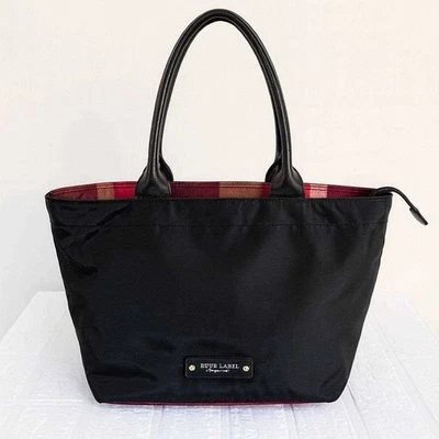 Bolso de Mano Burberry Azul Etiqueta Forro a Cuadros Nylon Negro Para Mujer Usado Japón Foto 1 de 4