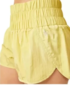 FREE PEOPLE FP Movement The Way Home Shorts Pomelo Yellow Medium NWT - Picture 1 of 4