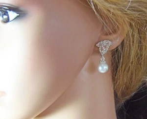 Pendientes con clip de perlas y diamantes - Imagen 1 de 5