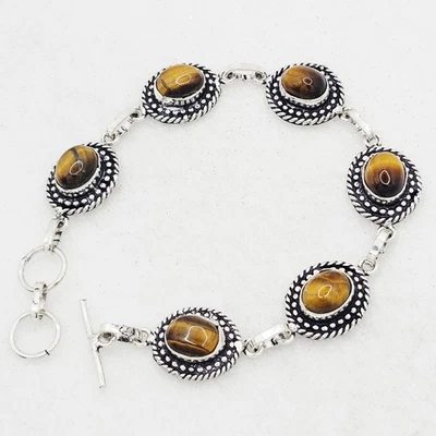Pulsera artesanal 7,5 con cristales naturales ojo de tigre costa oeste plata de ley Foto 1 de 3