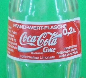 COCA-COLA * Botella de Coca-Cola 0,2 L * Etiqueta de papel * Idioma alemán * 1986 *Vidrio transparente - Imagen 1 de 2