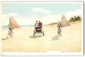 DAYTONA BEACH, FLORIDA Locomobile Vs. Bicycle, Ormond 1900s UDB Antique Postcard - Picture 1 of 2