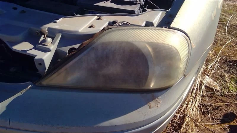Faro izquierdo del conductor compatible con 00-05 Mercury Sable OEM Foto 1 de 4