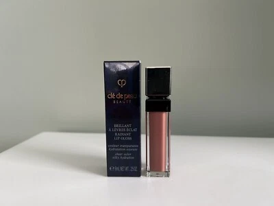 Cle de Peau BRILLANT À LÈVRES ÉCLAT BRILLO DE LABIOS RADIANTE #2 Cristal cálido, nuevo en caja Foto 1 de 3