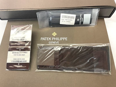 Correa de polímero Patek negra A22, bolsa OEM, OEM 4 barras de resorte Aquanaut tamaño mediano Foto 1 de 4