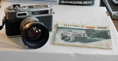 Yashica Electro 35 GSN 35mm Rangefinder Film Camera and Two Screw on Lenses - Image 1 of 4