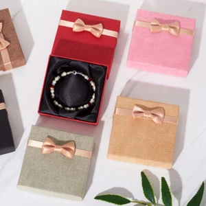 24 un. caja de regalo cuadrada cajas de pulsera de cartón tapas de moño color mixto 8,8 cm - Imagen 1 de 6