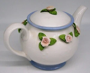 TETERA VINTAGE COLECCIONABLE TELEFLORA PORCELANA CERÁMICA APLICADA 3D ROSAS ROSAS ROSAS - Imagen 1 de 6