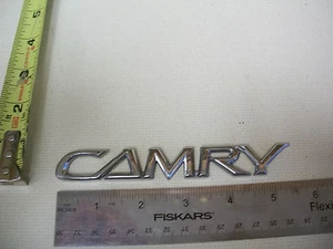 TOYOTA CAMRY SCIPT EMBLEM CHROME BAGDE OEM USED ORIGINAL  W FREE SHIPPING - Picture 1 of 1